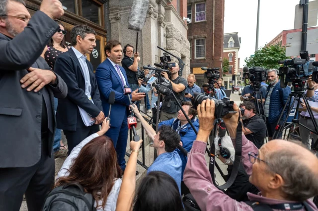 Ben Gideon speaking with the press