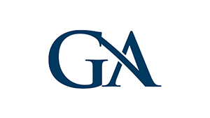 Gideon Asen attorney working at desk