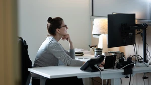 Gideon Asen attorney working at desk
