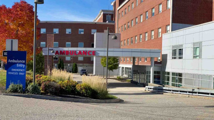 Hospital ambulance entrance in autumn representing medical malpractice lawsuit in Maine